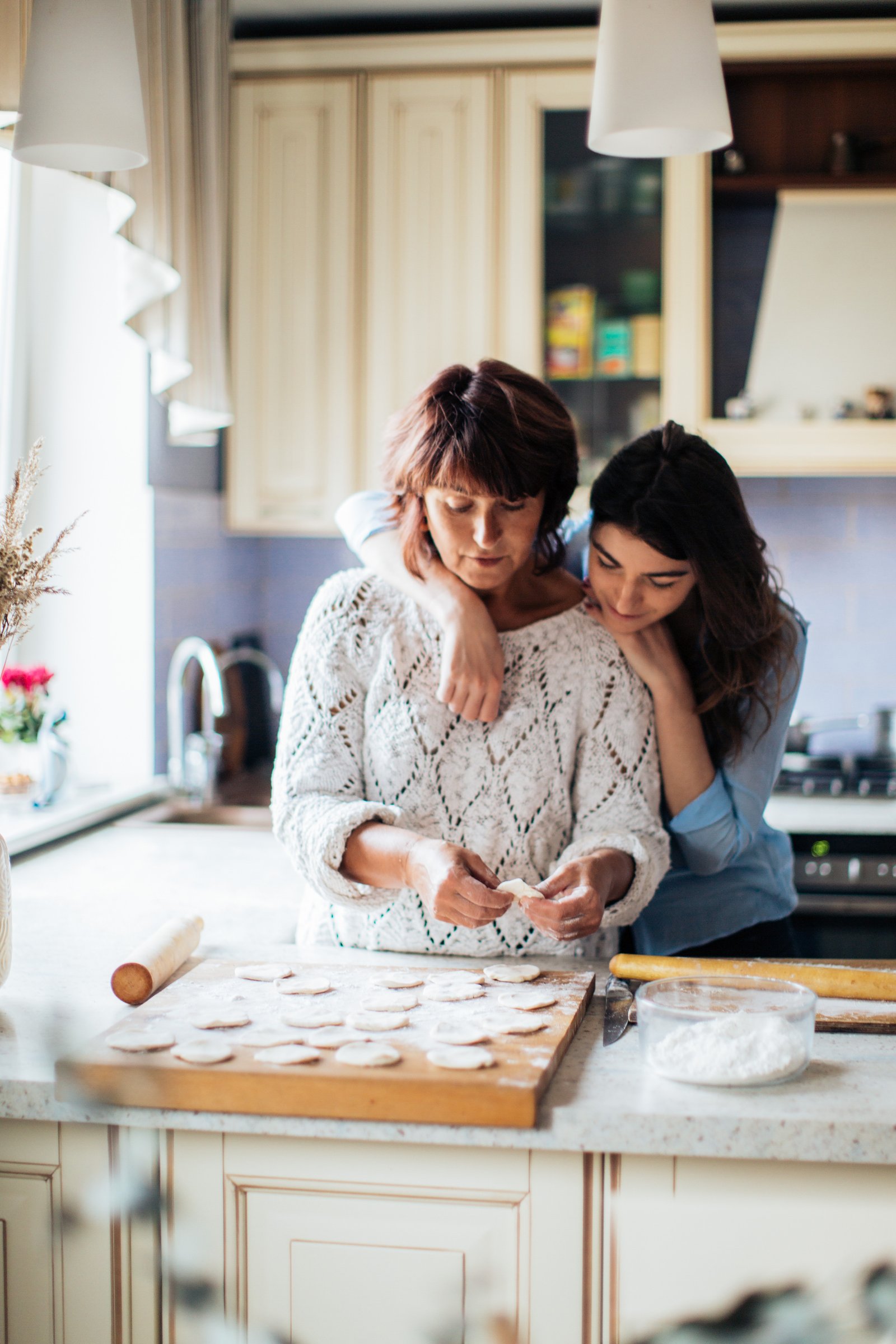 mother-daughter-cooking-parents-treating-you-differently-to-your-male-siblings