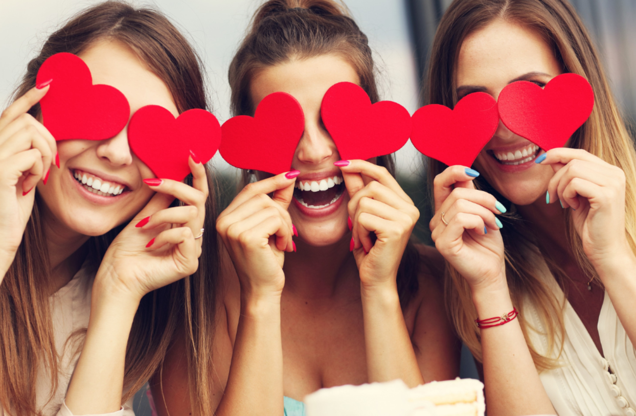 Galentine's Day Girlfriends Holding Hearts