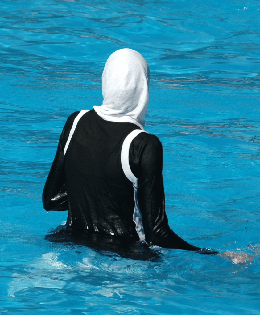 Muslim Woman with Hijab in Women-Only Swimming Pool
