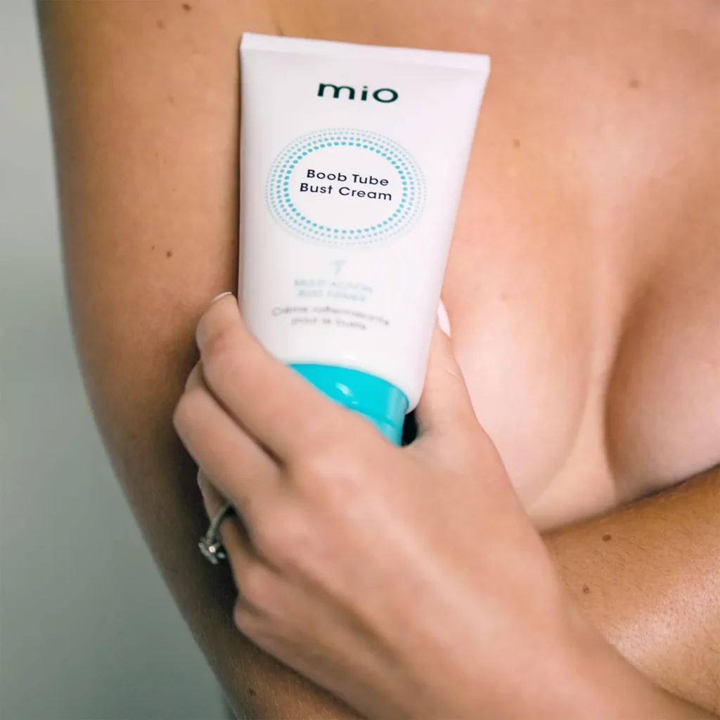 Mio Boob Tube Bust Cream Against Woman's Breasts