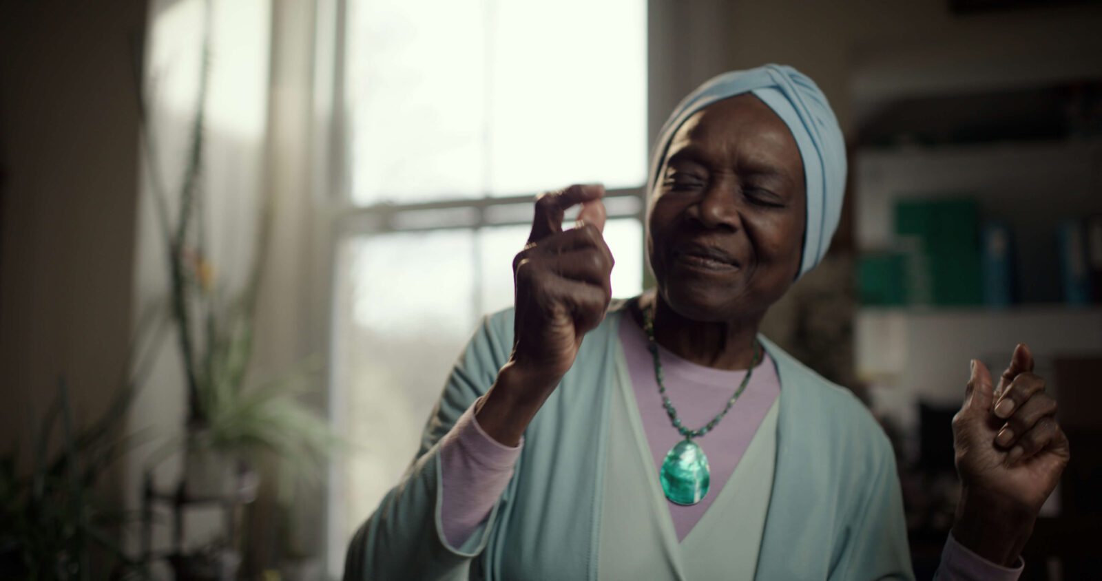 Black Woman With Dementia Dancing in Museum of Memories Dementia Campaign