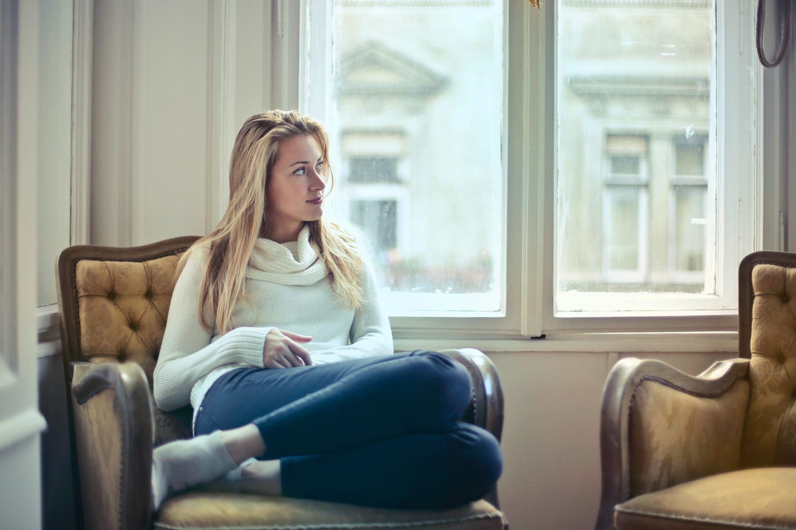 Single Woman Sitting in House - Safety Tips for Women Living Alone