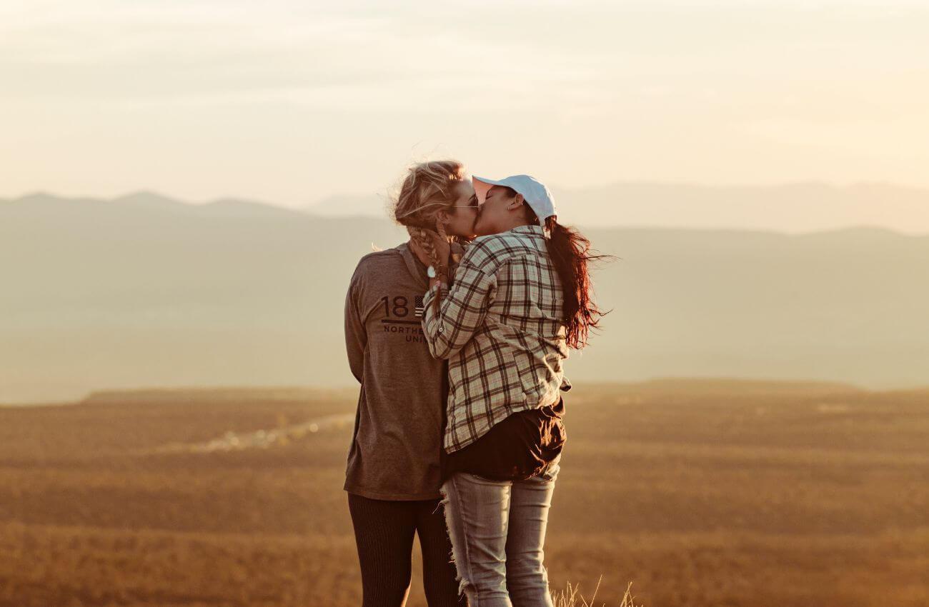 Two Women Lesbian Couple Kissing On Holiday - Honeymoon Trends