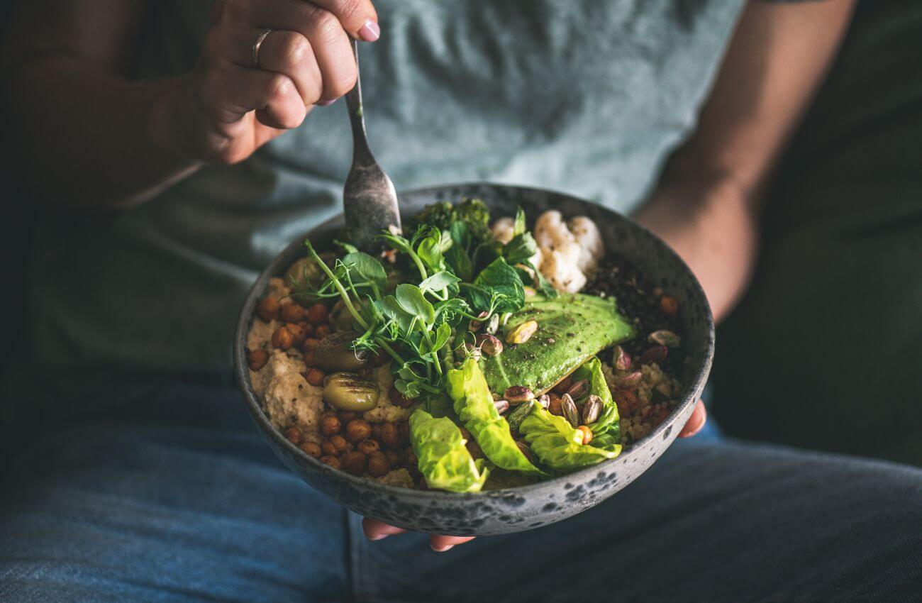 Woman With Bowl of Healthy Food - Plant-Based Diet - Health Benefits For Women