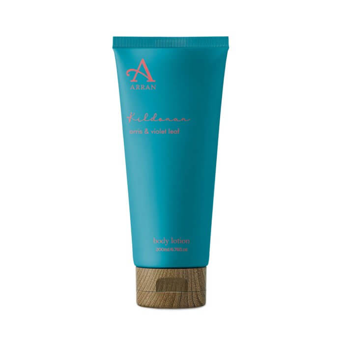 Blue tube of Arran Kildonan body lotion with a wooden cap, labeled 'orris & violet leaf'