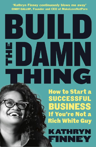 Book cover for Build the Damn Thing by Kathryn Finney, featuring large bold navy text on a teal background. The subtitle reads, “How to Start a Successful Business If You’re Not a Rich White Guy.” A black-and-white photo of the author smiling appears at the bottom, along with a quote from Cindy Gallop praising the book.