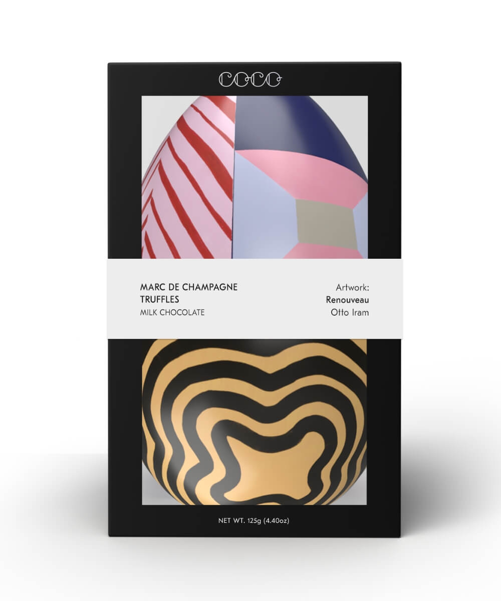 Coco Chocolatier Marc de Champagne milk chocolate truffles in Easter egg tin in box with black packaging and colourful abstract egg artwork by Otto Iram
