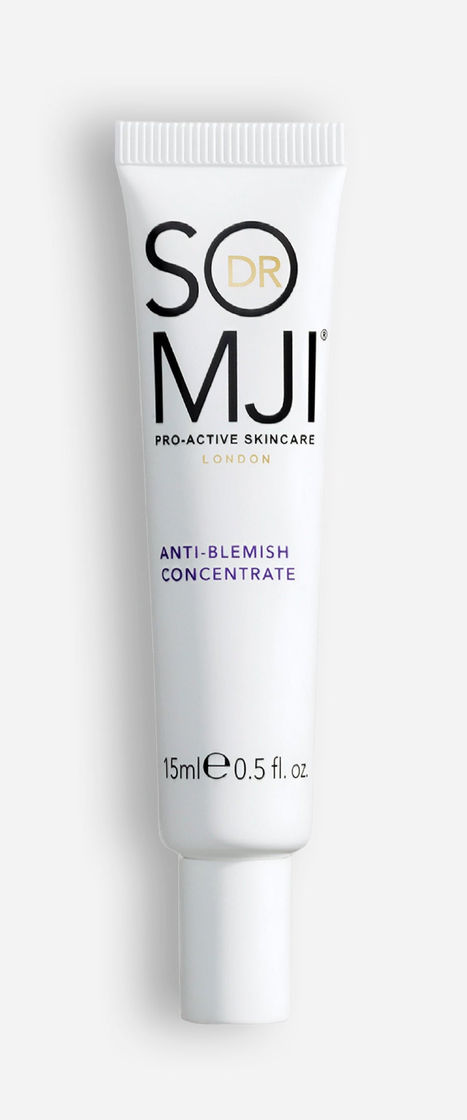 A white tube of Dr Somji Skincare Pro-Active Skincare London Anti-Blemish Concentrate, 15 ml (0.5 fl oz), with black and gold lettering on a plain white background