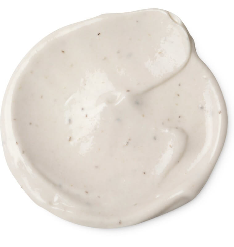 Product image of Lush's 'Sympathy for the Skin' body lotion, creamy body lotion spread with small exfoliating particles