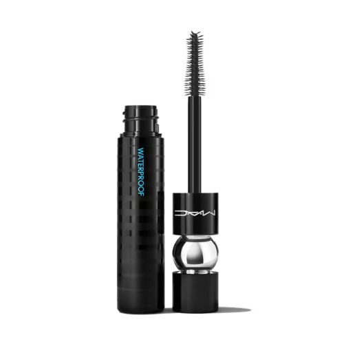 A black tube of MAC Stack waterproof mascara with the wand applicator removed, revealing the brush; the tube has blue text and a silver detail near the base