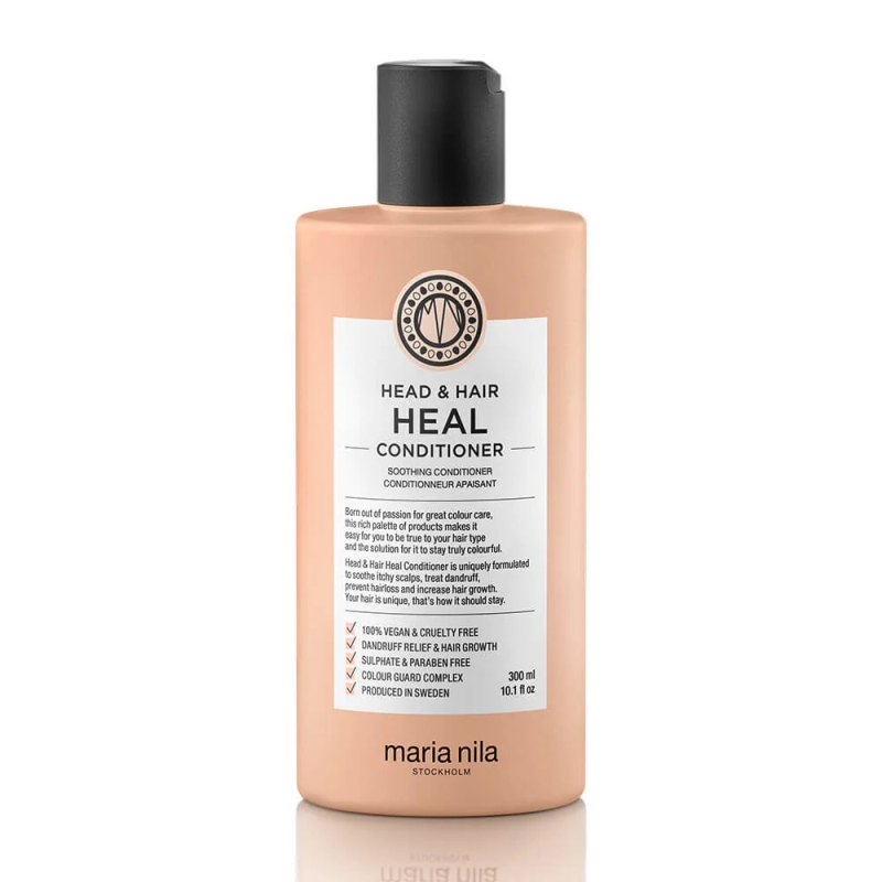 A beige bottle of Maria Nila Head & Hair Heal Conditioner with a black cap and white label