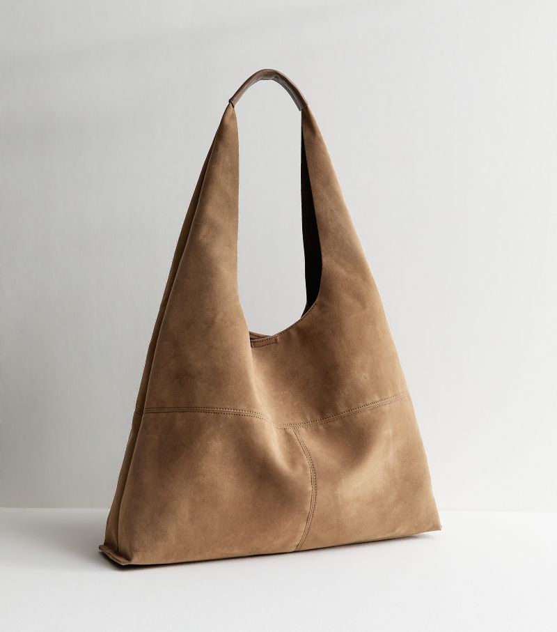 New Look camel oversized faux suede panel tote bag with soft slouchy silhouette and wide shoulder strap.