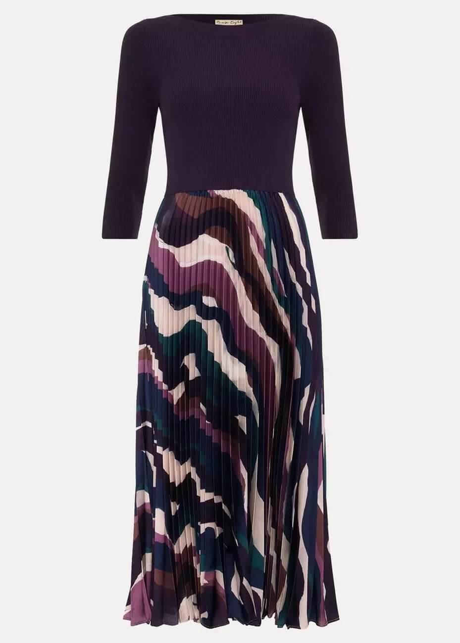 Phase Eight Riley Woven Dress, a pleated dress featuring a purple fitted bodice and a colourful abstract pattern on the skirt