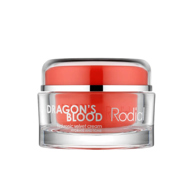 Red hyaluronic velvet cream in a clear jar with a silver lid and the label 'Dragon's Blood' by Rodial