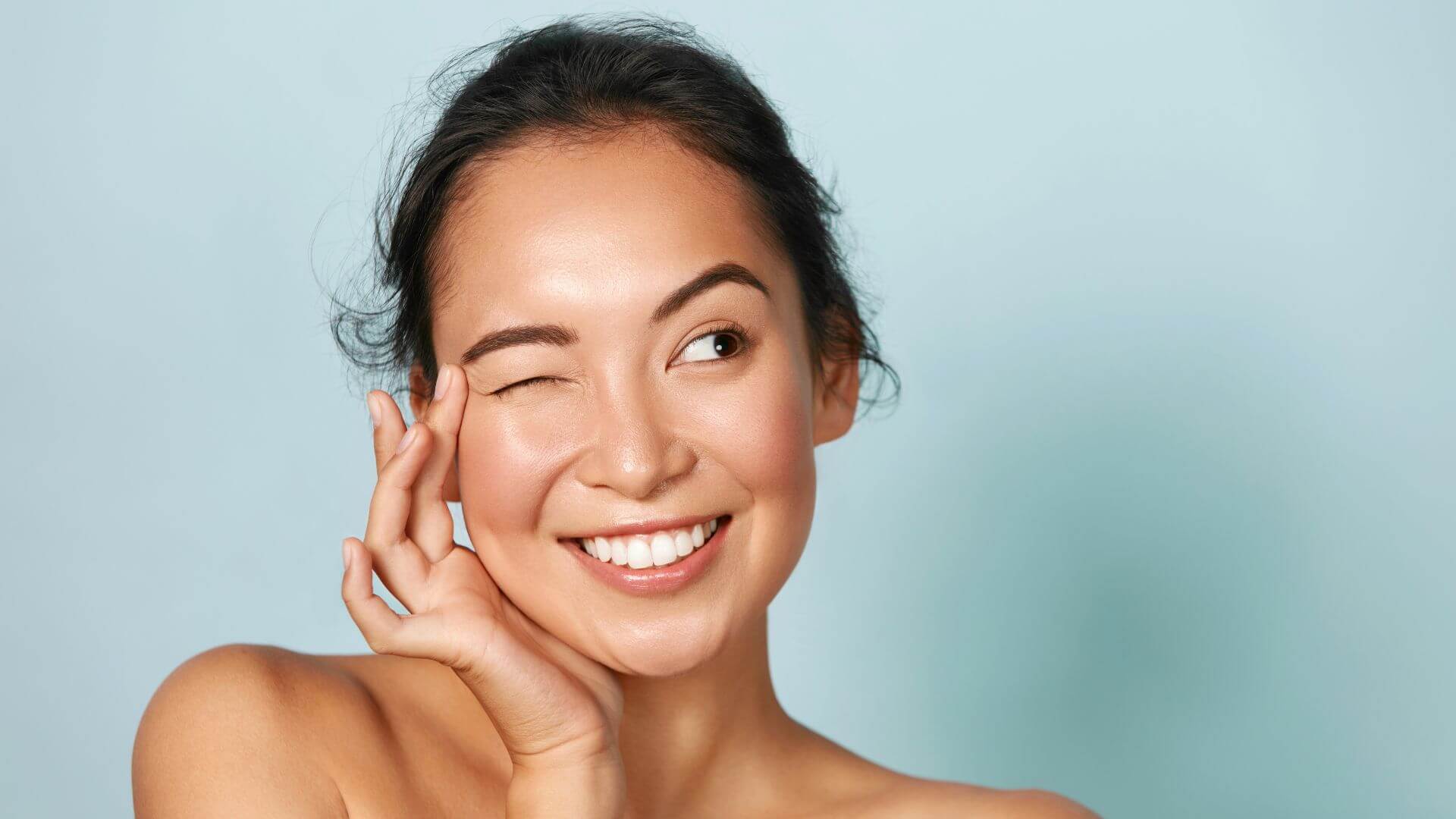 Woman with glowing skin representing Profhilo Structura injectable treatment review