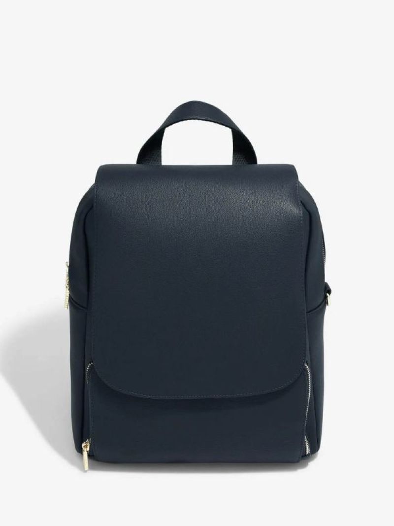 Stackers navy blue backpack with sleek curved silhouette and zip compartments. A stylish yet practical option for work or travel, offering organised storage in a compact design.