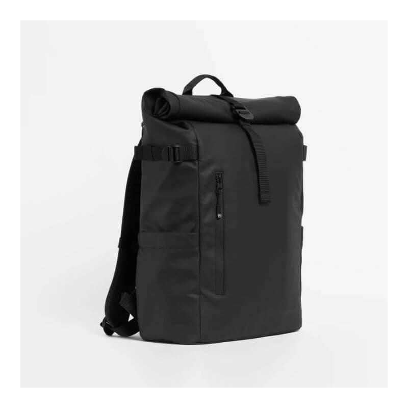 Stubble & Co black 20L roll-top backpack shown in angled product view with adjustable straps and front zip pocket. This durable, minimalist backpack is perfect for daily commuting or weekend trips.