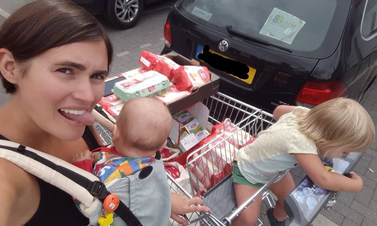 Lisa de Boer balancing motherhood and entrepreneurship while shopping with her children during the early stages of building The Biskery after maternity leave